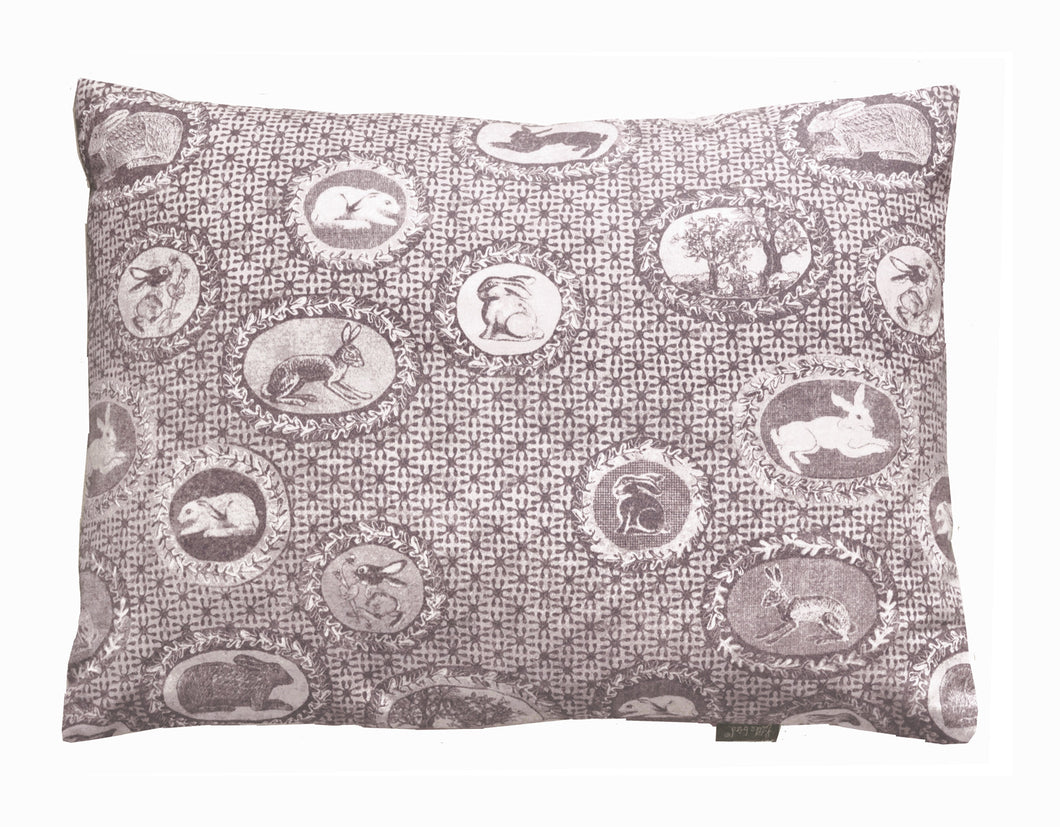 patterned cotton cushion,bunnies and rabbits printed in chocolate brown,a twist on Toile de jouy,English designer based in Norfolk.Pattern lovers choice.