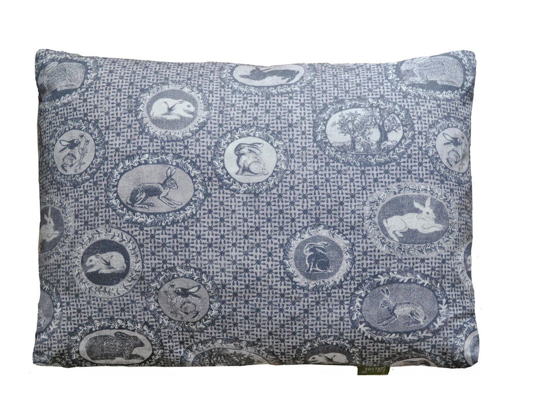 patterned cotton cushion,bunnies and rabbits printed in Inky purple,a twist on Toile de jouy,English designer based in Norfolk.Pattern lovers choice.