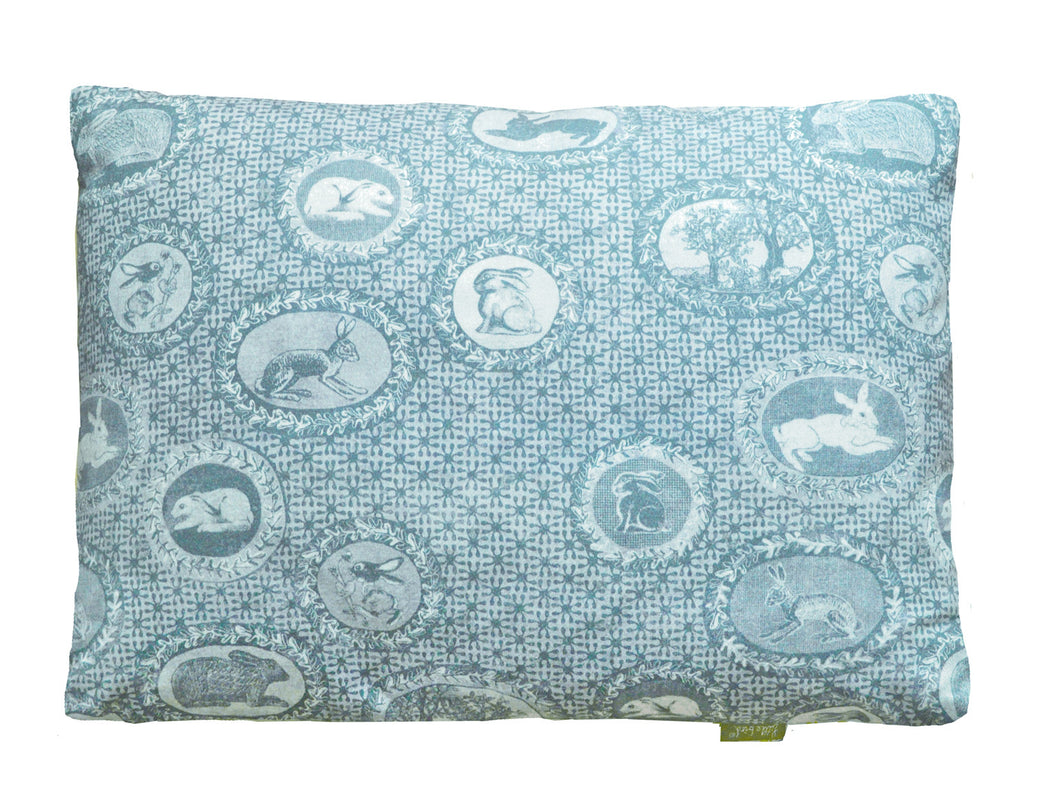 patterned cotton cushion,bunnies and rabbits printed in turquoise blue,a twist on Toile de jouy,English designer based in Norfolk.Pattern lovers choice..